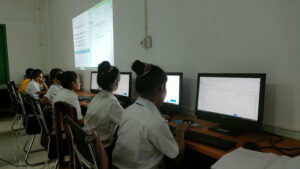 students receiving basic IT education